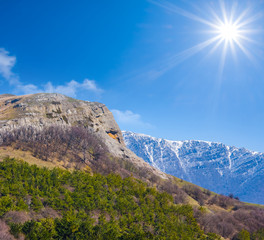 mountain valley under a sparkle sun