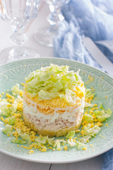Layered salad with chicken and Chinese cabbage, selective focus