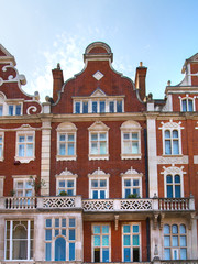 Fototapeta premium London, UK. Residential area of Kensington and Chelsea. Row of periodic buildings. 