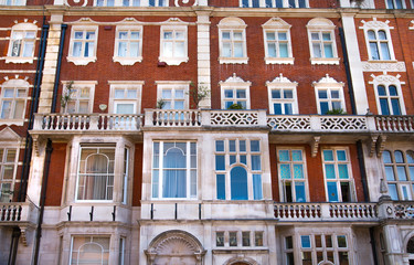 London, UK. Residential area of Kensington and Chelsea. Row of periodic buildings. 