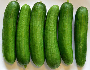 Fresh pickles waiting to be cut and fermented in homemade brine 
