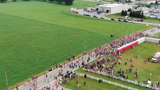 Aerial flyover, runners prepare for country 5k foot race in Amish Country, Bird-In-Hand, Pennsylvania. USA
