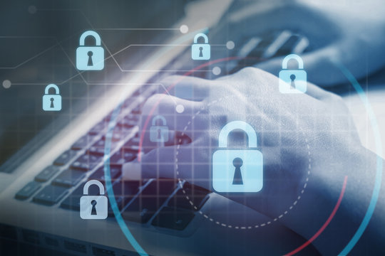 Hand typing on keyboard;Concept of data security 