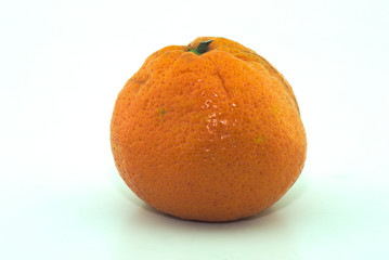 ripe orange mandarin on a white background close-up