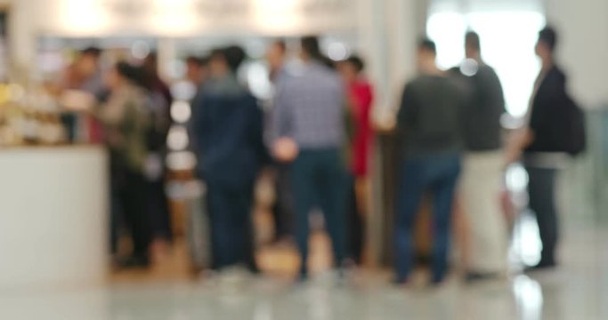 Blur view of people in shopping mall