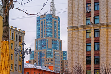 Fototapeta premium Cityscape with modern building and tall skyscraper of business center Domnikov