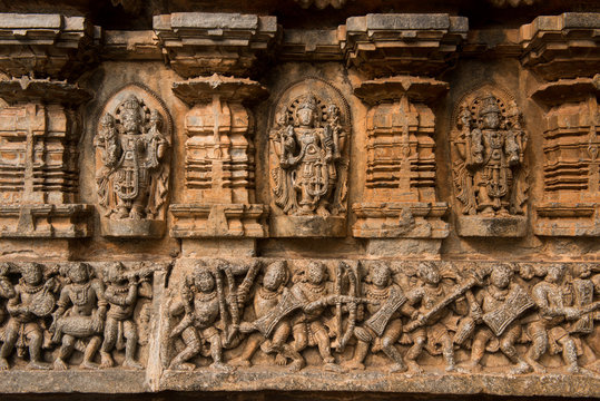 Artistic Stone Sculptures And Carvings Of Hindu Gods And Goddesses At Somanathapura Temple In Karnataka, India. 