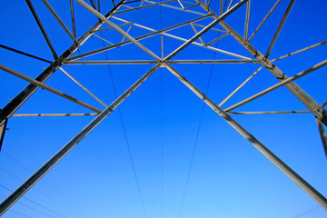 Obraz premium Electric power tower bottom view