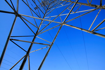 Obraz premium Electric power tower bottom view