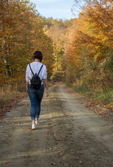 Girl Walking on a Hiking Trail