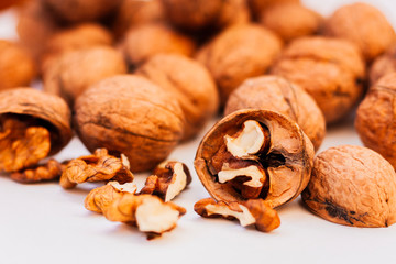 Whole walnuts kernels on white background