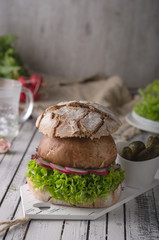Fototapeta na wymiar Portobello burger, homemade bun and lettuce