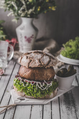 Portobello burger, homemade bun and lettuce