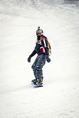 Fototapeta na wymiar Enjoying In Snowboarding