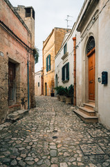 Fototapeta na wymiar A cobblestone street, in Matera, Basilicata, Italy