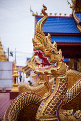 Fototapeta na wymiar Payanak status in Thai temple Sukhothai 