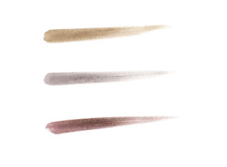 Set of matte eyeshadows in natural colors, brush or sponge strokes, smudged eye shadows or blushes. Isolated on white background.