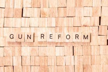 Gun Reform spelled out in wooden letters