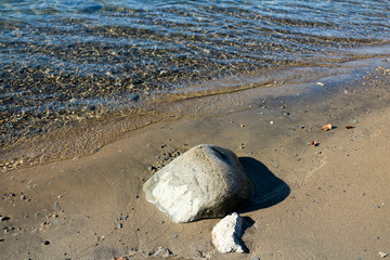 Rocks on a warm beach