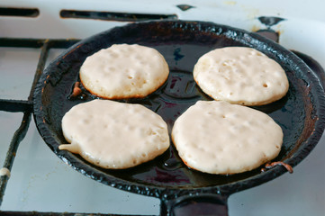 Bake pancakes. Homemade cakes.