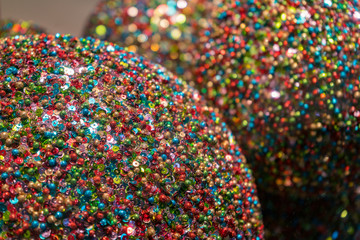 multicolored christmas ball closeup. colorful background