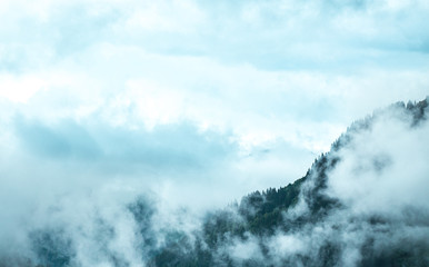 Naklejka premium Mountains with fog