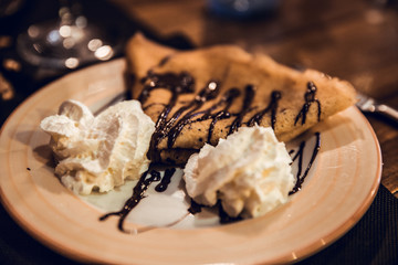 Dessert with cream and chocolate