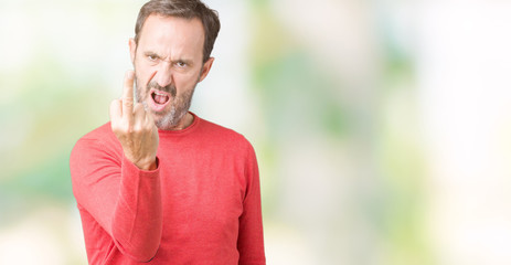 Handsome middle age hoary senior man wearing winter sweater over isolated background Showing middle...