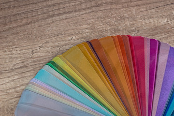 Color samples for painting on wooden table closeup