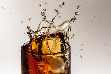 cola splash, there is some movement in the splashes close up