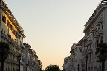 symmetry classic building in Greek city center view from bellow point in street with clear evening...