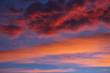 dramatic sky with orange clouds at sunset