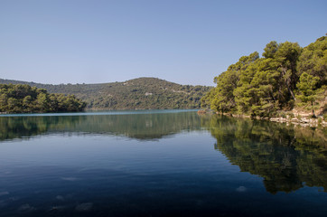 Fototapeta na wymiar the big lake in the morning, seascape at mljiet island national park. big lake coast. croatia, dalmatia.