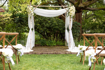 Lacer wedding alter at an outdoor ceremony