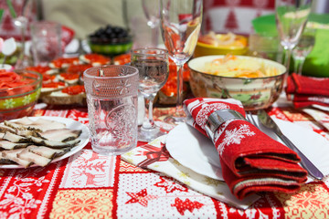 Festive table with snacks to celebrate the New Year in the kitchen, at home