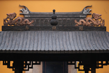 Detail of metal incence bowl decorated with dragons in a chinese temple in the old town of Suzhou city, China, Asia
