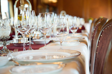 Place setting with lots of wine glasses