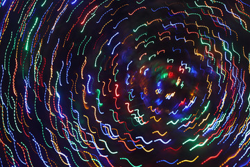 Varied whirling lights on Christmas tree as artistic effects