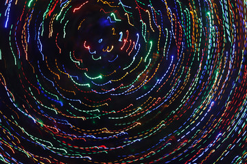 Varied whirling lights on Christmas tree as artistic effects