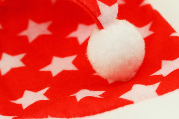 Red and white Christmas hat with pom-pom
