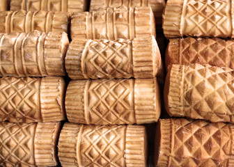 Obraz premium Oscypek cheese - traditional mountain product of Poland, Zakopane. Cheese is made of goat, cow and sheep milk