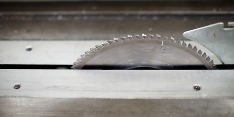 Circular saw, metal and plastic cutting, saw blade machine background.