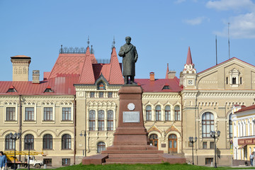 RYBINSK, RUSSIA. A monument to V.I. Lenin against the background of the building of Historical and architectural art memorial estate