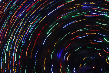 Varied whirling lights on Christmas tree as artistic effects