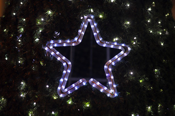 Varied whirling lights on Christmas tree as artistic effects