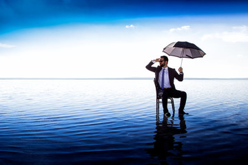 A business man in a suit with an umbrella on top of a lake. amazing surreal business world