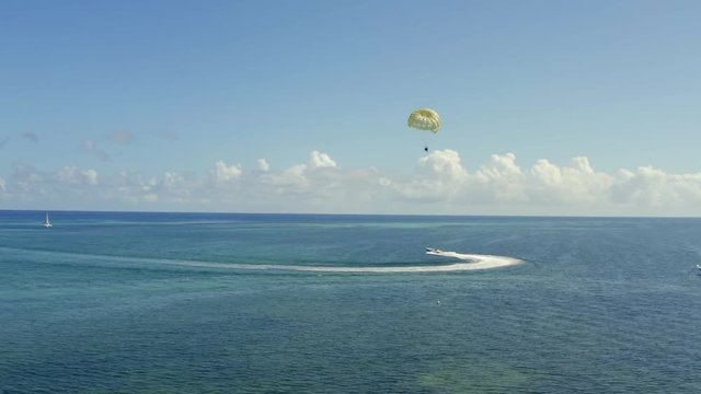 Aerial view of parasailing at a wonderful caribbean beach, Punta Cana, Dominican Republic