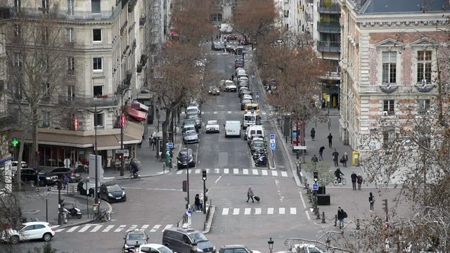 Cityscape of Paris: streets and crossroad with traffic