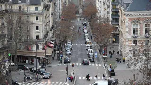 Cityscape of Paris: streets and crossroad with traffic