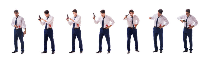 Businessman wounded in gun fight isolated on white